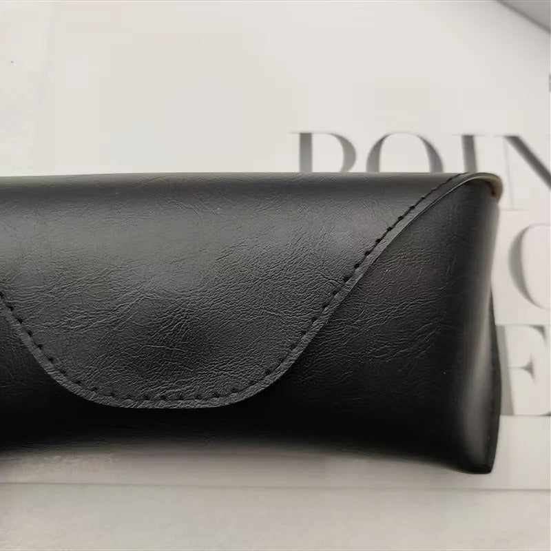 Black leather glasses case with magnetic closure