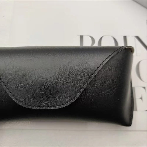 Black leather glasses case with magnetic closure